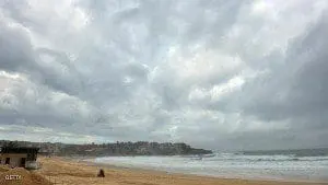 Storm clouds gather over Sydney's Bondi Beach as the city battles cyclonic wind gusts and non-stop downpours on April 22, 2015. Heavy rain and high winds battered Sydney and other areas for a third day causing widespread chaos, with emergency services dealing with nearly 10,000 calls for help and a "cruise from hell" finally docking. AFP PHOTO / Peter PARKS        (Photo credit should read PETER PARKS/AFP/Getty Images)