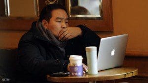 A man uses his computer in a coffee shop in Shanghai on February 2 2012 As Facebook prepares to go public it has its sights on China where the social media titan is blocked but analysts say its chances of re entering the market of half a billion Internet users are slim AFP PHOTO Peter PARKS Photo credit should read PETER PARKSAFPGetty Images