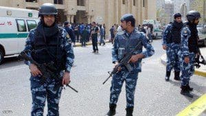 Kuwaiti security forces gather outside the Shiite Al Imam al Sadeq mosque after it was targeted by a suicide bombing during Friday prayers on June 26 2015 in Kuwait City The Islamic State group affiliated group in Saudi Arabia calling itself Najd Province said militant Abu Suleiman al Muwahhid carried out the attack which it claimed was spreading Shiite teachings among Sunni Muslims AFP PHOTO STR Photo credit should read STRAFPGetty Images