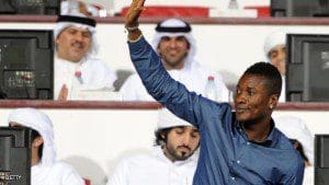 Ghana's football champion Asomoah Gyan waves to the crowd upon his arrival to attend a match at the Al-Ain Club in the Gulf emirate of Al-Ain on September 16, 2011. Gyan signed earlier in the week a contract to play for the Emirati club.  AFP PHOTO/STR (Photo credit should read -/AFP/Getty Images)