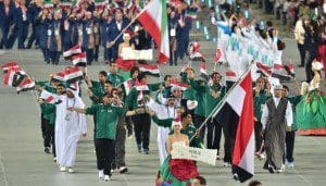 Iraq's Mahmmod Younus carries his national flag as he leads their delegation parade during the opening ceremony of the 2014 Asian Games at the Incheon Asiad Main Stadium in Incheon on September 19, 2014. AFP PHOTO / JUNG YEON-JE        (Photo credit should read JUNG YEON-JE/AFP/Getty Images)